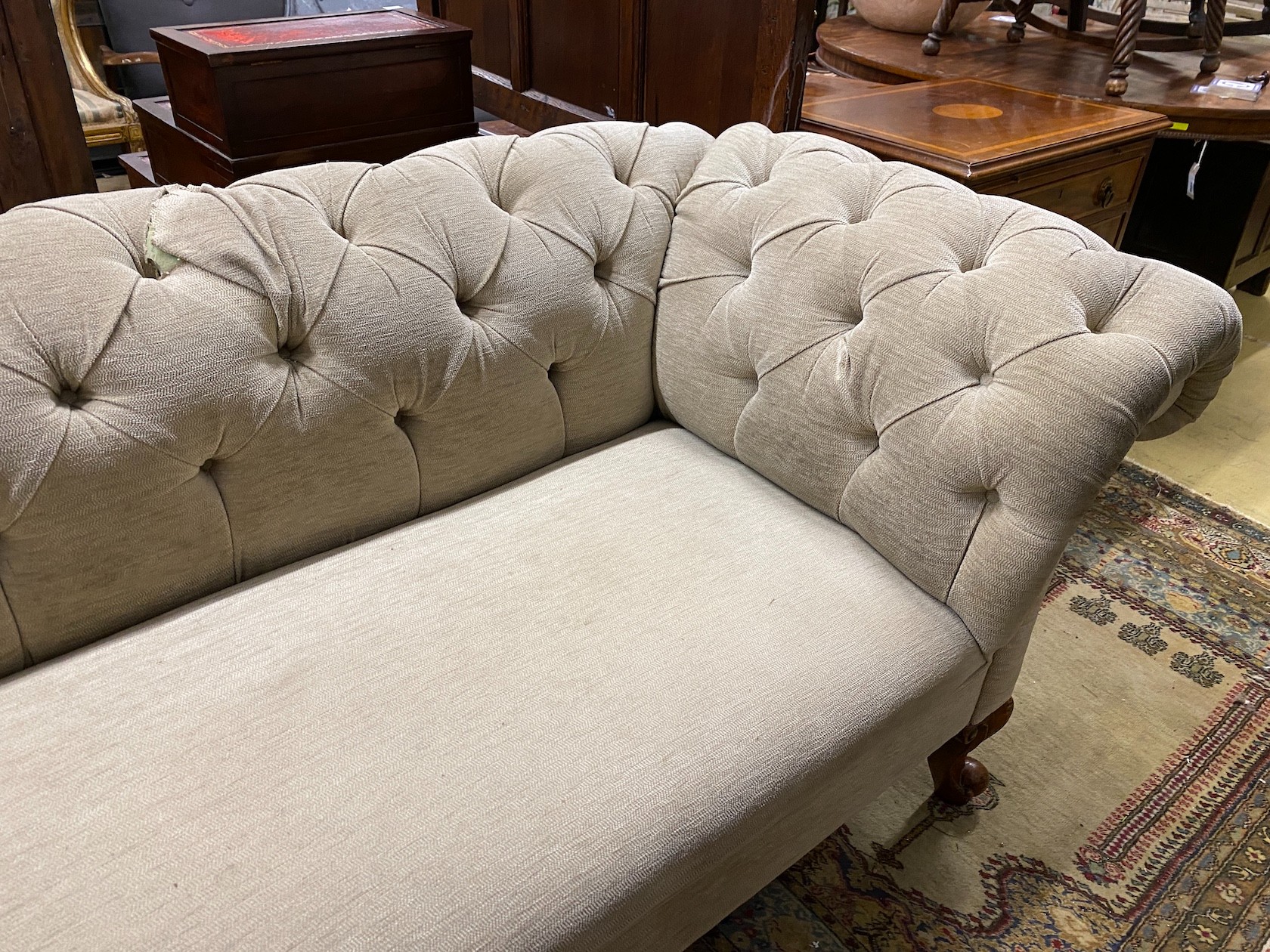 A Victorian Chesterfield settee upholstered in buttoned pale green fabric, length 190cm, width 90cm, height 75cm
